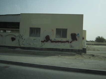 Anti-regime graffiti then covered in red paint buy the government-which brings more attention to dissent.